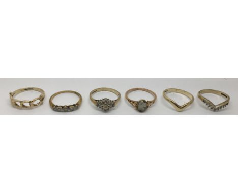 Six 9ct gold rings, some stone set.Approx weight 100g, K-N