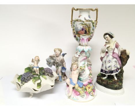 A German late 19th Century Porcelain candle stick an ornate vase a dish and cover and other figures.