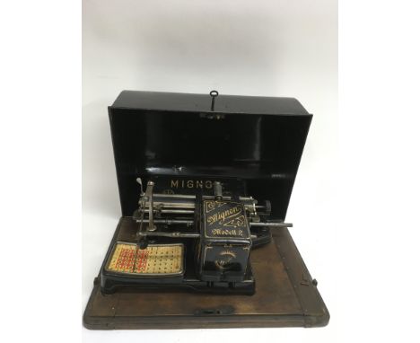 A vintage German Mignon typewriter in metal case.Approx 29x40 cm