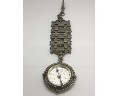 A large Victorian white metal compass fob.