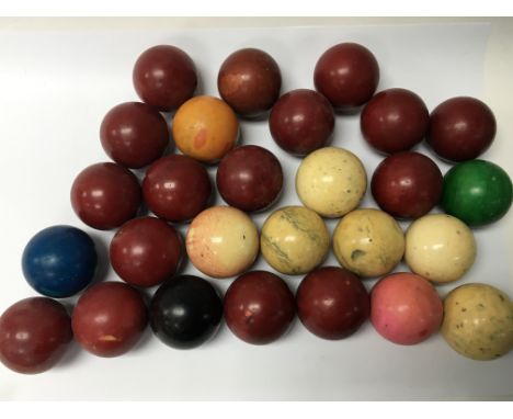 A collection of antique ivory snooker and billiard balls. (27)