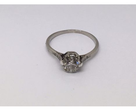 A platinum and diamond ring, approx 1.6g and approx size L.