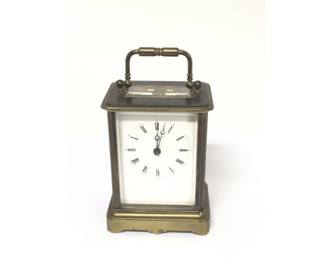 A brass cased carriage clock maker Brevete A Paris. seen working.
