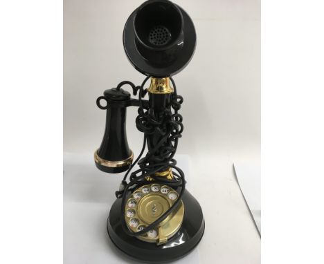 A stick telephone