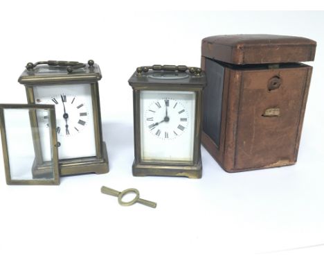 A brass cased carriage clock in a fitted case and one other carriage clock for restoration. (2)