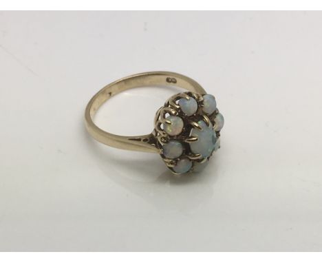 A 9ct gold opal cluster ring, approx 2.7g and approx size O-P.