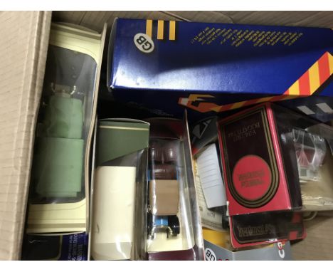 Two boxes containing model cars