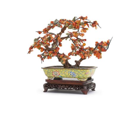 An attractive Chinese Canton enamel jardinière with hardstone tree, Qing dynasty, late 19th century, the branches with flecke