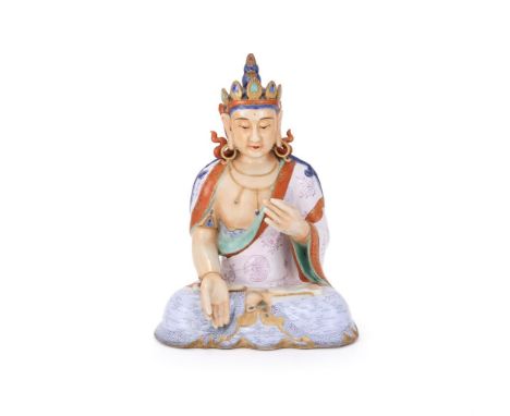 A Chinese Famille Rose model of Buddha, early 20th century, the deity seated in dhyanasana, his face with benevolent expressi