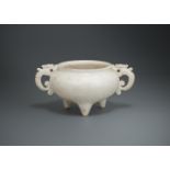 A Chinese carved marble tripod censer