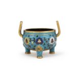 A Chinese cloisonné tripod censer