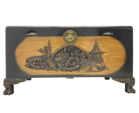 Singapore camphor wood blanket chest, rectangular hinged top with carved panel depicting traditional pagoda and river scenesD