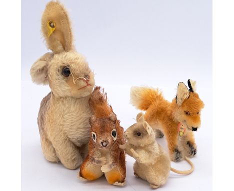 Steiff group of vintage mohair animals, including Xorry fox, Pieps mouse, Perri (Walt Disney) squirrel, and Sonny rabbit; all