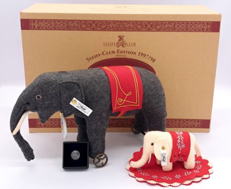 Steiff Elephant pair including: (1) Club Edition Elephant on Wheels 1914 Replica, 1997, white tag 420115, LE, grey felt (disc