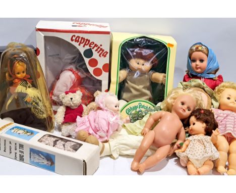 Collection of vinyl, hard plastic and porcelain dolls including Cabbage Patch doll; Good; (Qty).