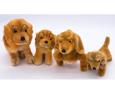 Steiff group of mohair dogs: Revue Susi (x2) and Hexie (x2). 1950s-70s, Good Plus to Excellent, 3 out of 4 missing button in 