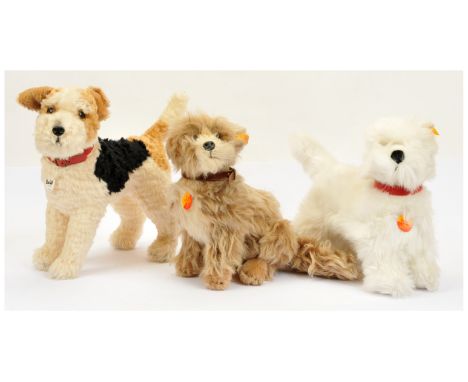 Steiff trio of mohair and plush dogs: Foxy, yellow tag 031717, mohair, 14"/35cm; Treff Skye terrier, yellow tag 031663, mohai