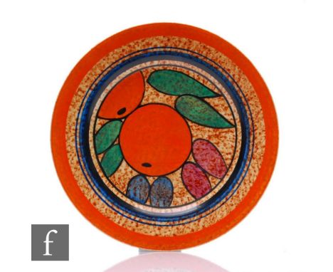 A Clarice Cliff Oranges Cafe au Lait circular plate circa 1931, hand painted with fruit and foliage over a brown stippled Caf