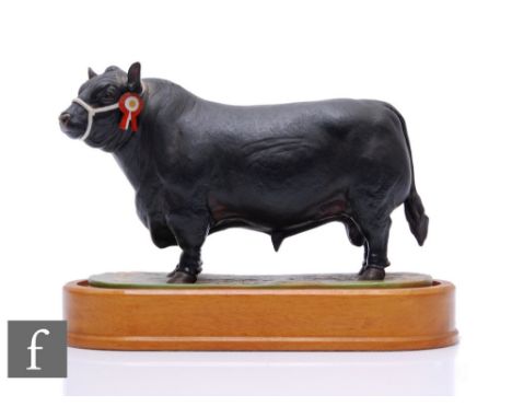 A Royal Worcester model of an Aberdeen Angus Bull, modelled by Doris Lindner, circa 1965, printed marks, complete with wooden