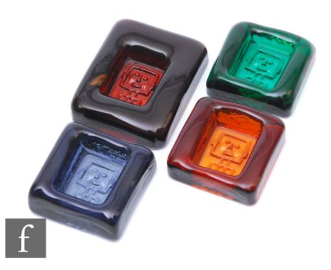 A set of four Swedish Kosta Boda Modernist glass slab Robot bowls or paperweights designed by Erik Hoglund, H699, circa 1960s