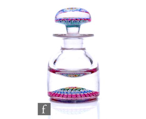 A Whitefriars glass inkwell, of footed domed form and internally decorated with a central shamrock silhouette, surrounded by 