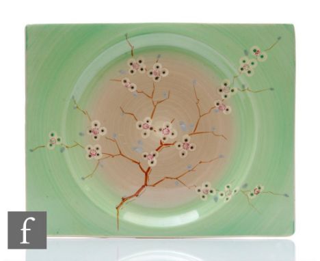 A large&nbsp;Clarice Cliff Biarritz plate circa 1935, hand painted in the May Blossom pattern with a stylised flowering bough