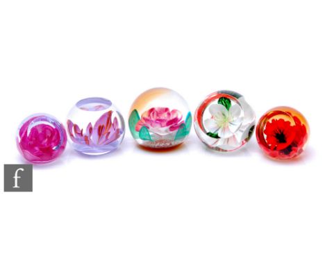 A later 20th Century Caithness glass paperweight, designed by Colin Terris in the Night and Day pattern, of domed form, inter