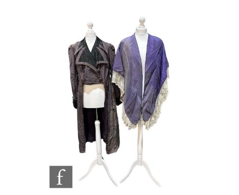 An early 19th Century cape, in purple silk with cream machine lace trim, together with an early 20th Century grey corded silk