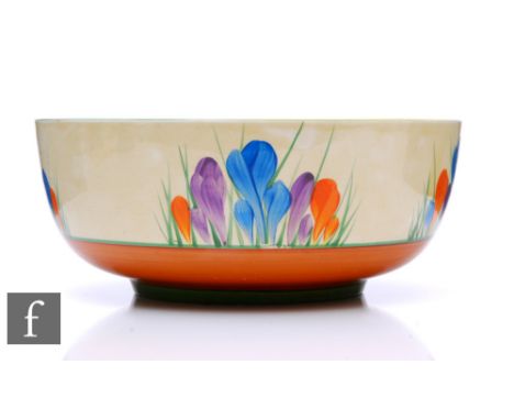 A large Clarice Cliff Holborn shape fruit bowl circa 1930, hand painted with Crocus sprays with yellow, green and brown bandi