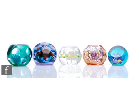 A late 20th Century Caithness glass paperweight, designed by Colin Terris in the Aquamarine pattern, internally decorated wit
