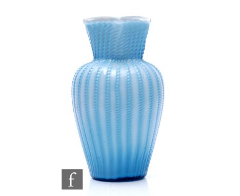 A late 19th Century Stourbridge glass vase of shouldered ovoid form with square collar neck, cased in a pale blue over opal w