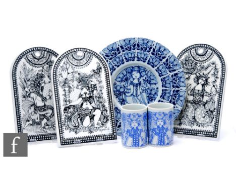 A group of three Nymolle wall plaques designed by Bjorn Wiinblad, of arched form with black figurative decoration over a whit