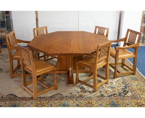 Robert 'Mouseman' Thompson of Leyburn, an oak octagonal dining table, hand adze top on a pedestal cruciform base, diameter 15