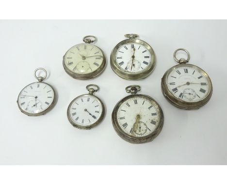 A collection of six vintage open faced pocket watches, including silver.