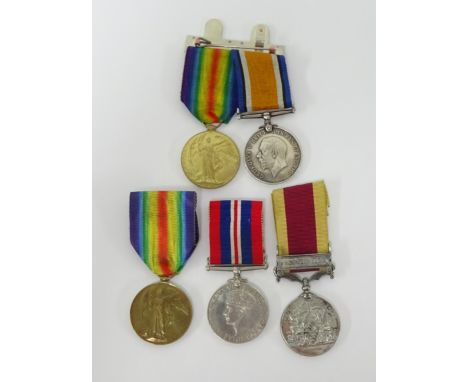 Two WWI medals awarded to DVR. H. Orton A.S.G, a Victory medal to W. Sander STO, a WWII medal and a replica China 1857 medal.