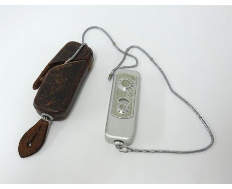 A micro pocket camera by Minox, marked Wetzler, in leather case.