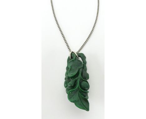 A carved green Jade pendant and chain, height 60mm.