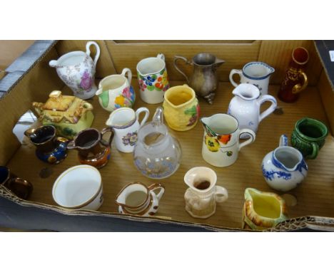 A collection of Jugs including Clarice Cliff and Royal Worcester.