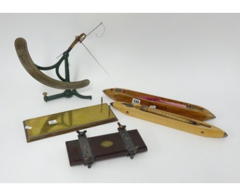 Lancaster and Company cloth weighing scales, large ginger beer bottle, cotton shuttles, crib board, tie press, and gun cleani