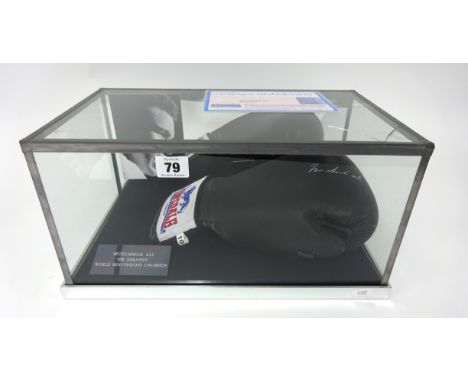 Sporting memorabilia, a signed Lonsdale boxing glove, reputedly Muhammed Ali, in presentation case.