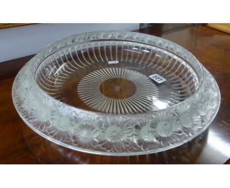 Lalique, a glass bowl with a Marguerite pattern, etched signature to base 'Lalique, France', diameter 37cm (small chip to ins