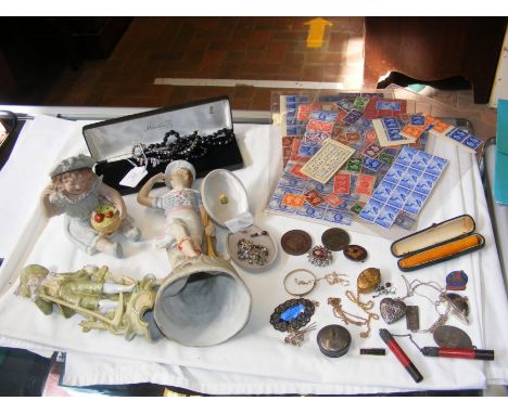 Various collectables including a piano doll, costume jewellery  