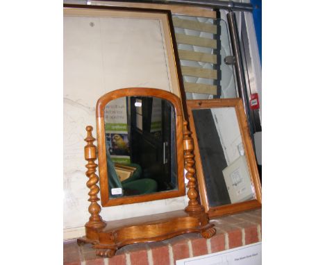 A dressing table swing mirror together with pine framed mirror