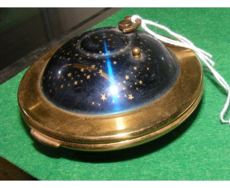 A vintage 1950's musical model Kigu flying saucer musical compact - 7cm diameter