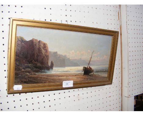 A small 19th century oil on canvas of coastal scene with fishing vessel on the shore, signed lower left - 17cm x 35cm