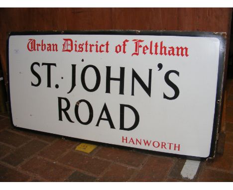 A vintage enamel street sign 'St Johns Road'