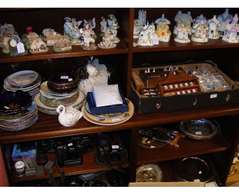 An extensive thimble collection, together with a china doll playing the piano and assorted collector's plates, etc. 