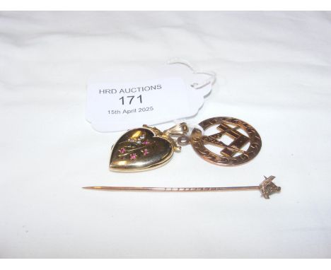 A 9ct Masonic medal pendant, together with a heart pendant and Masonic stick pin