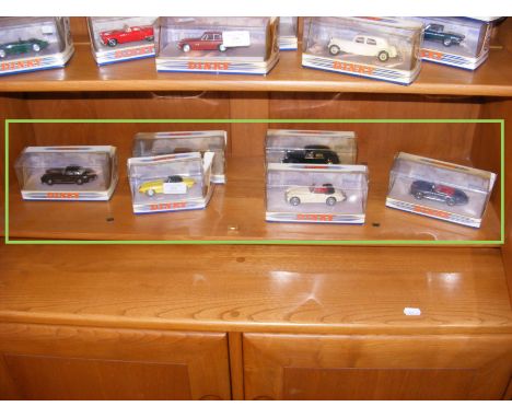 A selection of six boxed Dinky die cast vehicles including the 1960 Jaguar