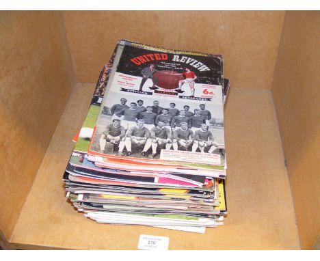 A quantity of football programmes 